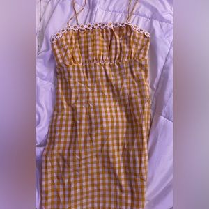 Yellow and white checkered sunflower mini dress